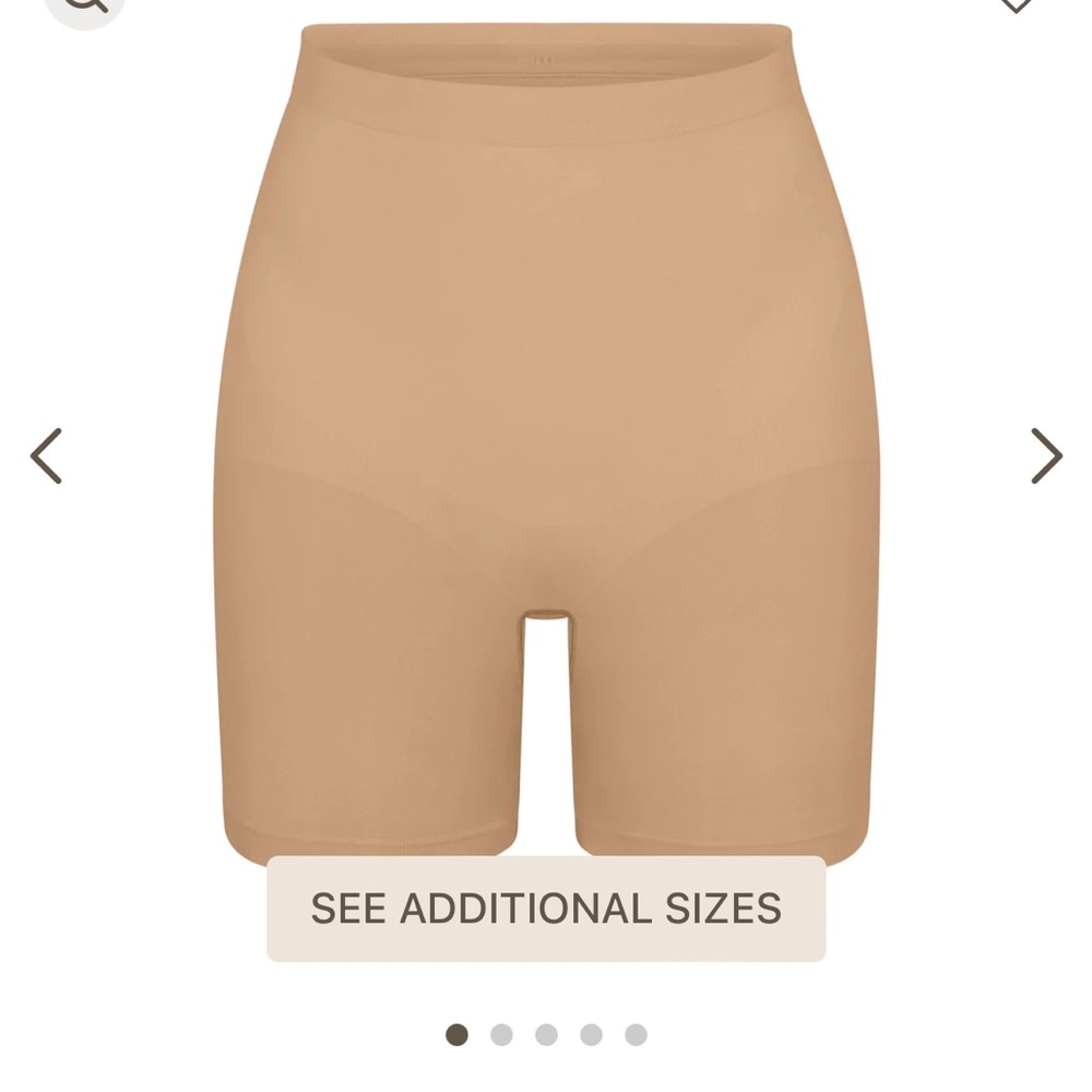 New, still in box SKIMS. Clay colored mid waist/mid thigh short